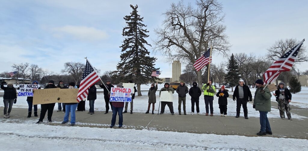 Small group protests Trump, Musk outside North Dakota Capitol during national movement