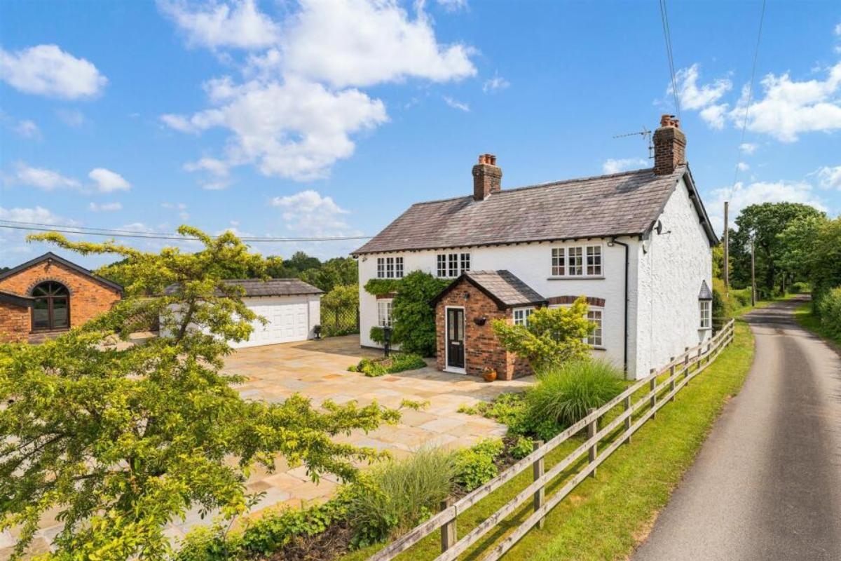 Cheshire farmhouse with indoor swimming pool and eight acres for sale at £2.5m
