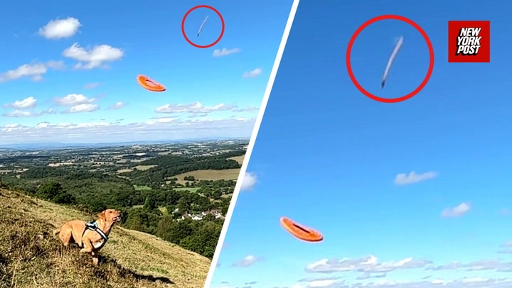 British man playing fetch with dog accidentally records possible UFO zooming through air