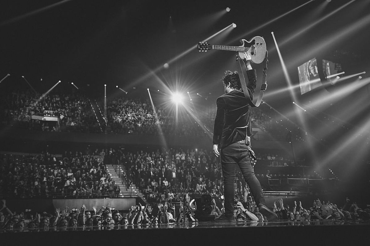 Rock Icon, 53, Kicks Fan Off Stage During Live Concert