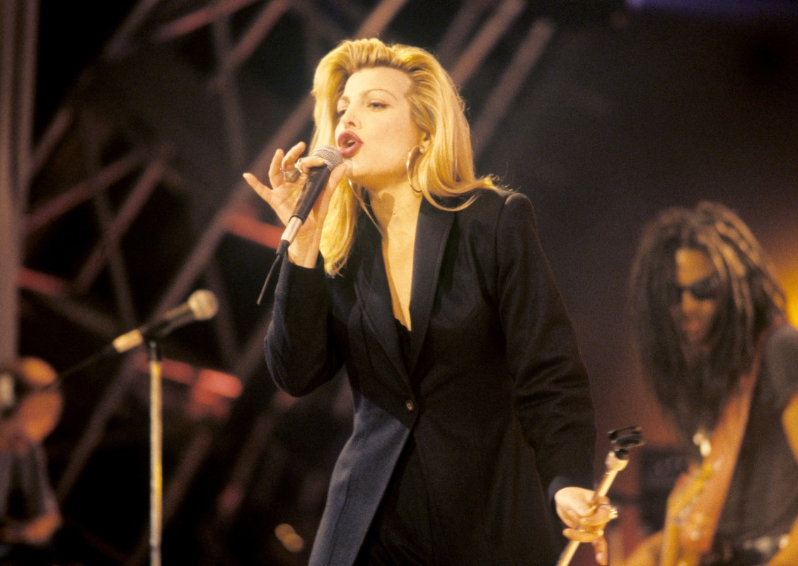 '80s Star, 63, Still Looks 'Insanely Hot' at Rare Concert Appearance After Cancer Battle