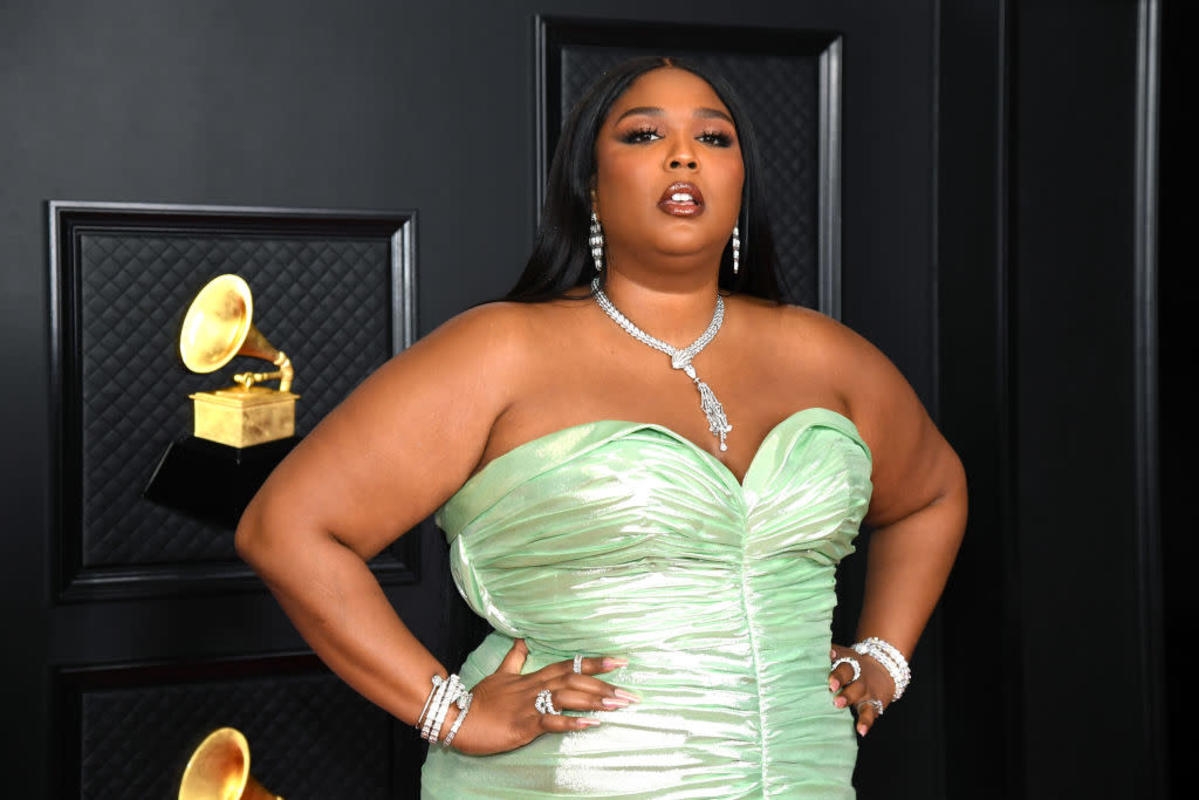 Lizzo, 37, Turns Heads in String Bikini — and a Ski Mask — After Recent Weight Loss