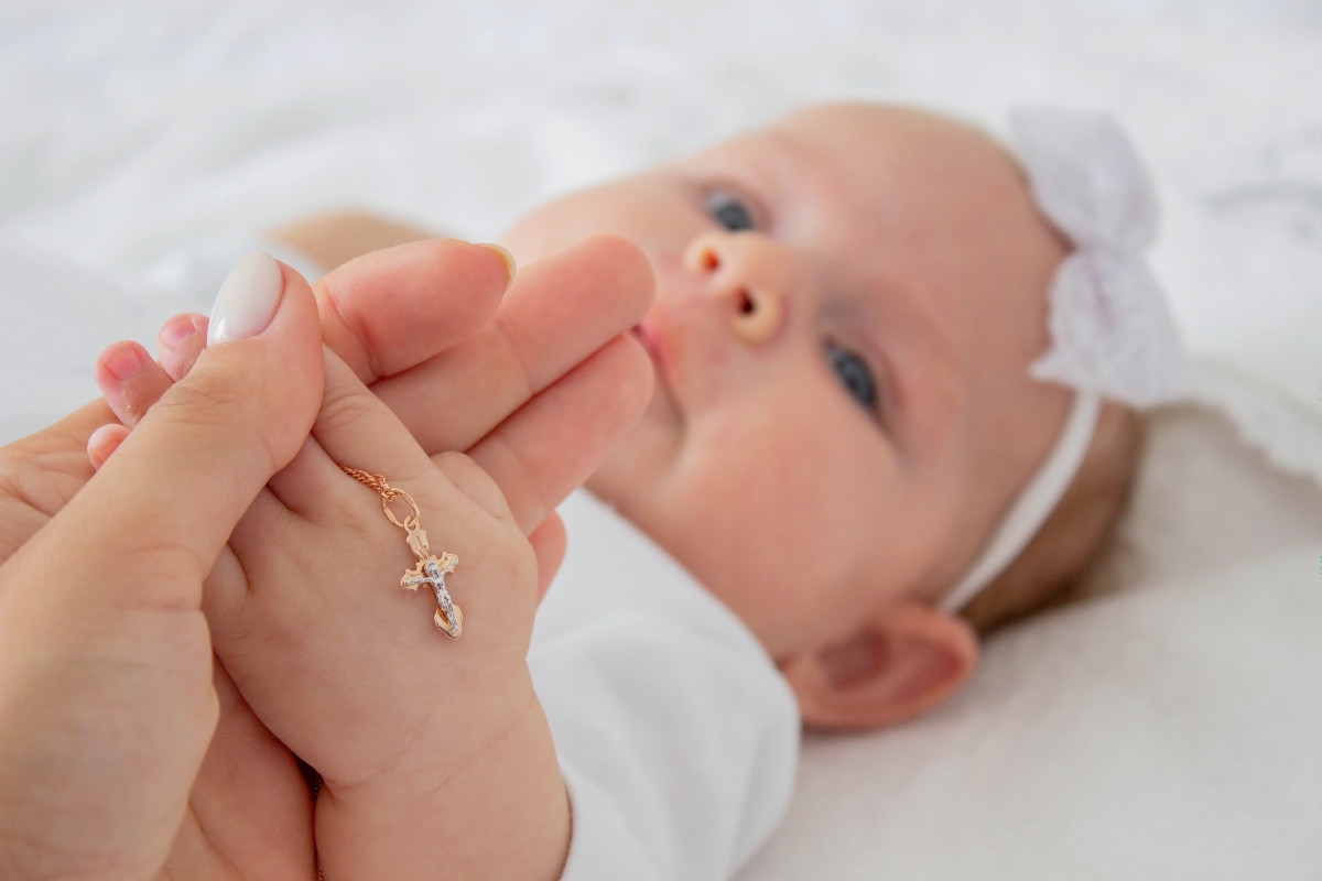 75 ‘Catholic Chic' Baby Names and Their Meanings for a Classic-Yet-Modern Vibe