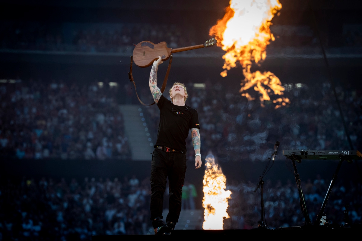 Grammy Winner 'Takes a Tumble' Mid-Performance in New Concert Video