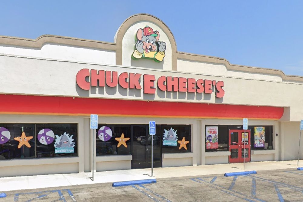 Woman Gets Stuck Inside of Chuck E. Cheese Game Before Getting Rescued by Firefighters