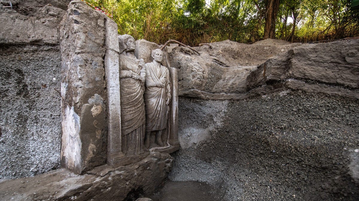 Archaeologists Discovered Two Life-Size Statues at Pompeii, Covered With Mysterious Symbols