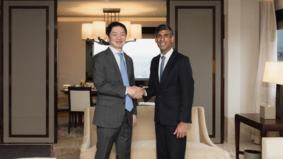 SK Networks President Sunghwan Choi encounters former UK Prime Minister
