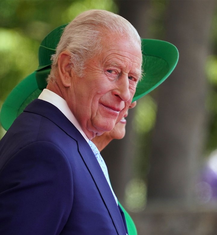 Camera Catches Striking Photo of King Charles Grinning to Himself During Solo Outing