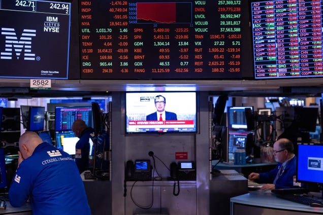 The Magnificent 7 stocks slide again and the Dow drops 1,400 points as China retaliates in trade war