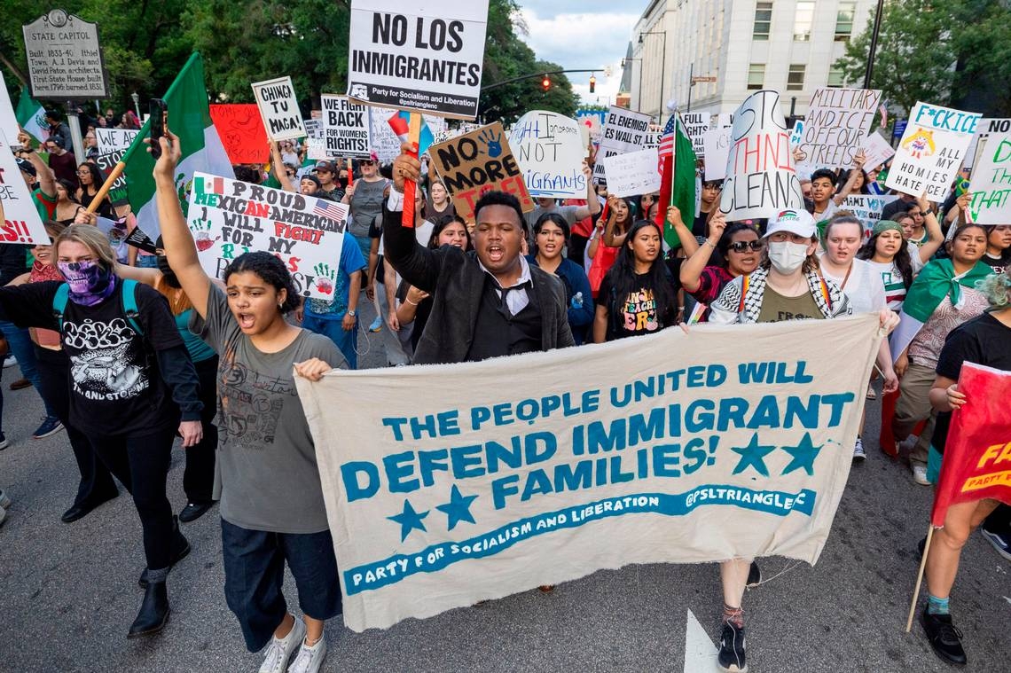 Protesters march in downtown Raleigh to rally against Trump immigration crackdown