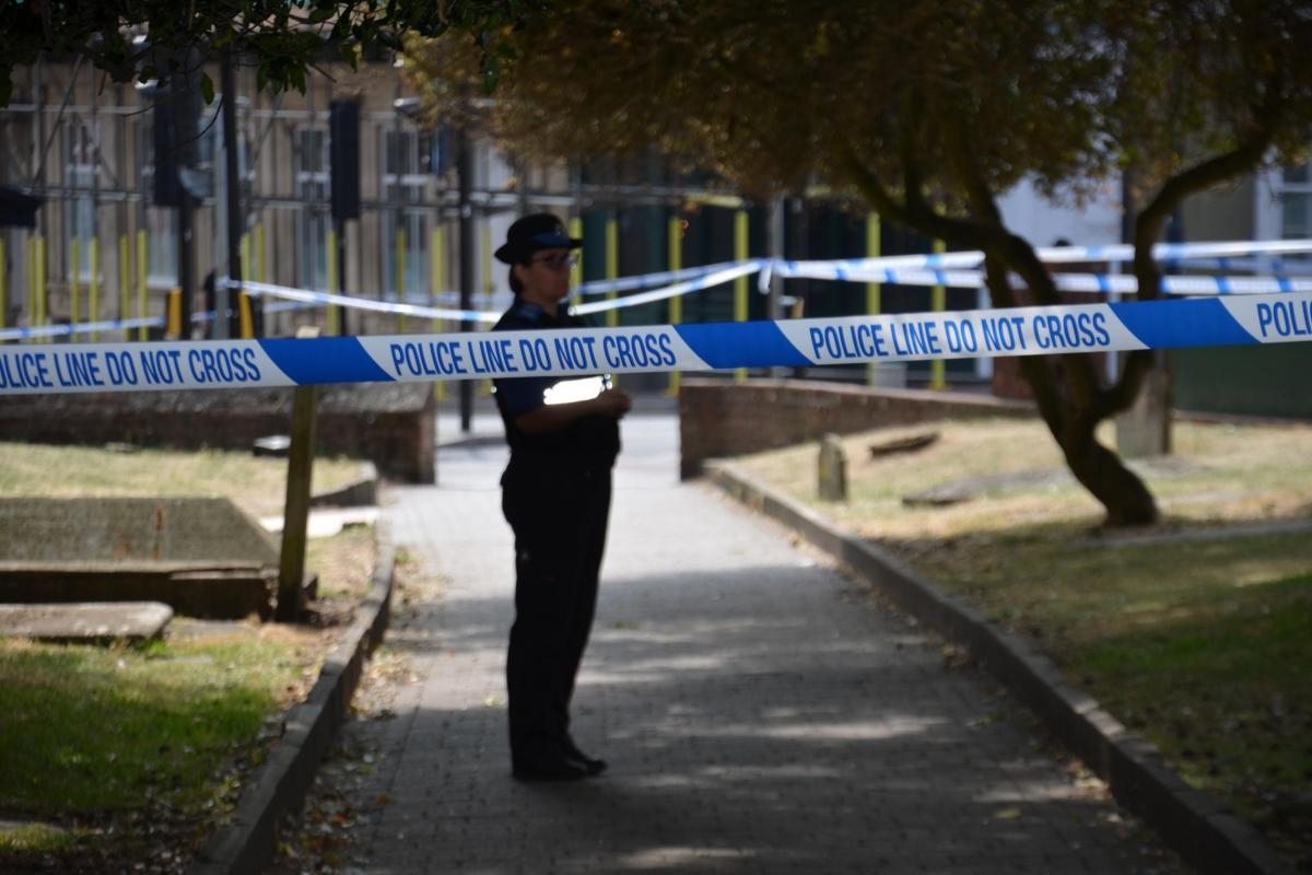 Pictures show forensics and police investigate attempted murder