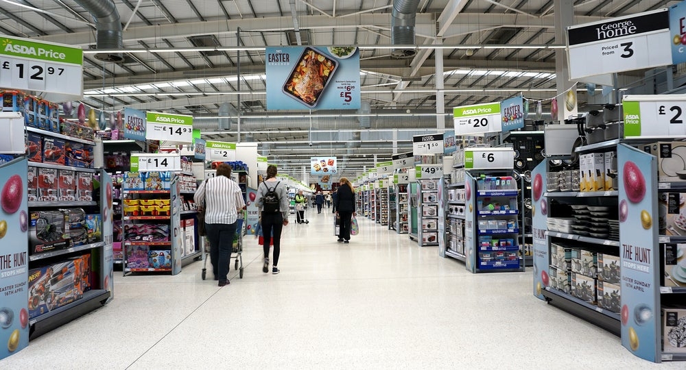 UK shoppers more upbeat but cut back on retail spending