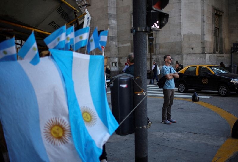 Analysis-Argentina takes baby step toward financial order with pricey $1 billion debt auction