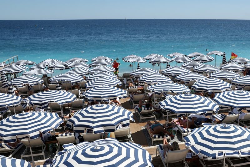Analysis-France's plan to cull public holidays may not help the economy