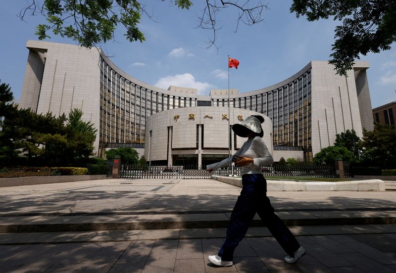 China cuts key rates to aid economy as trade war simmers