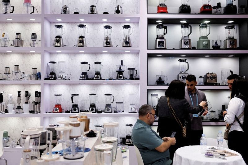 Analysis-Tariff-hit China exporters reluctant to heed government calls to sell locally