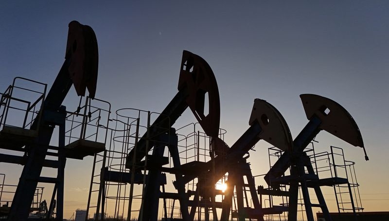 Oil heads for weekly gain but remains under supply hike pressure