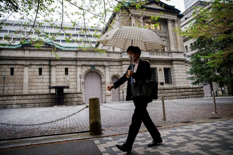 Investors react to BOJ decision to stand pat on interest rates