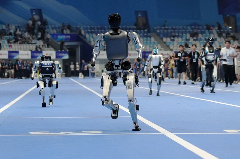 China's 'robot Olympics' sees humanoids from 16 nations compete in table tennis, football, track