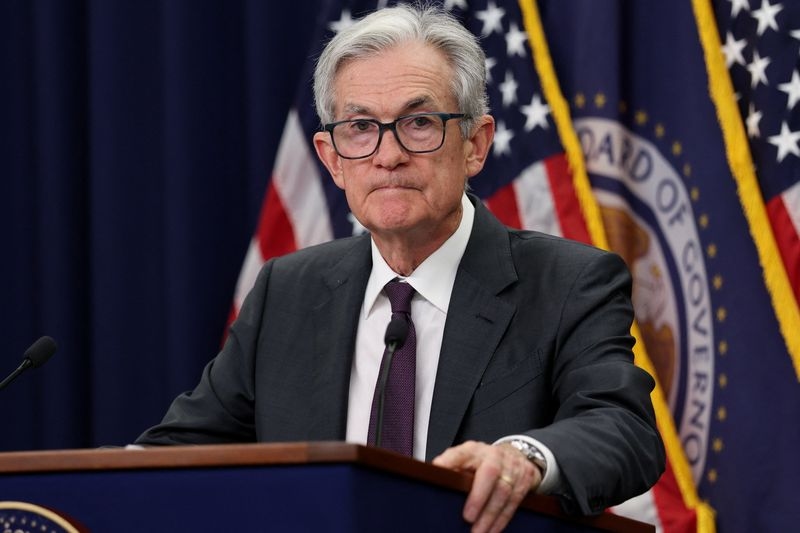 Trading Day: Powell in no rush to cut
