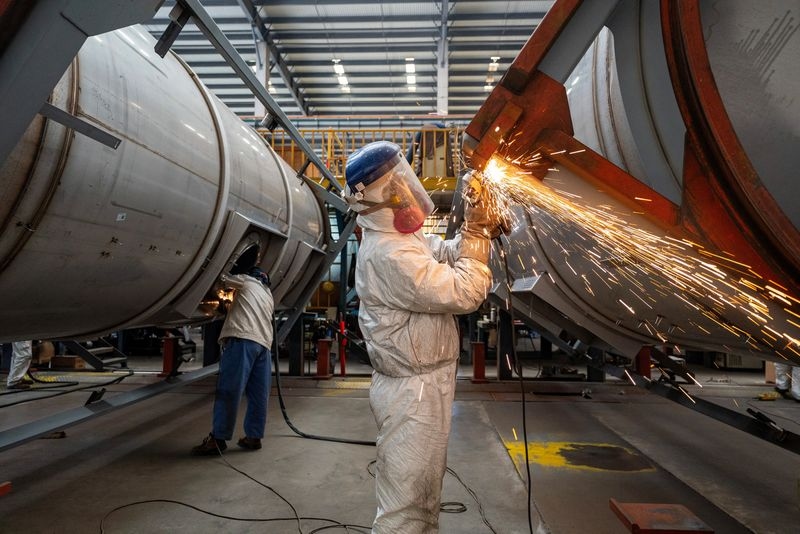 China's industrial profits slip back into sharp decline in May