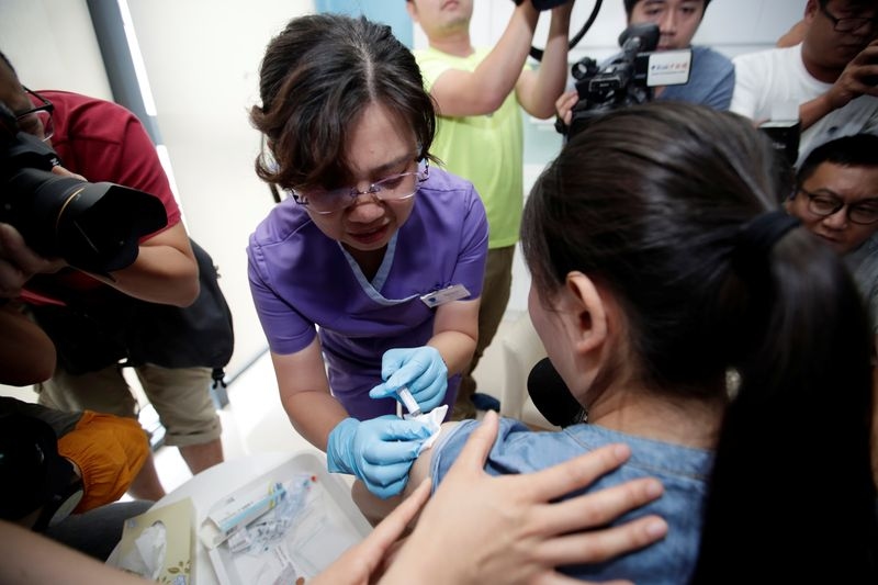 Merck to cut jobs and costs as demand for Gardasil in China remains weak