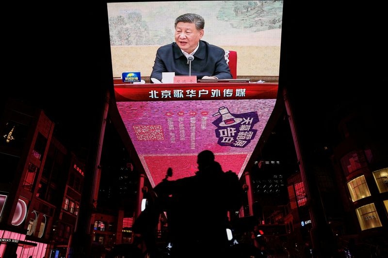 Analysis-China holds off on new stimulus, shows composure in US trade war