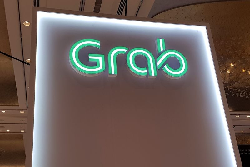 Grab looks to strike a deal to acquire Indonesia's GoTo in Q2, sources say