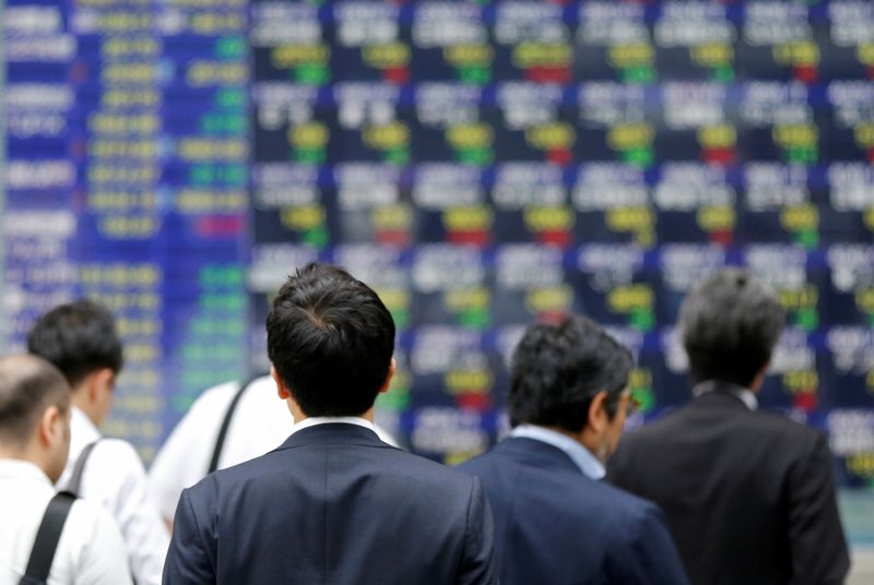 Japan March real wages down for third month, overtime pay falls