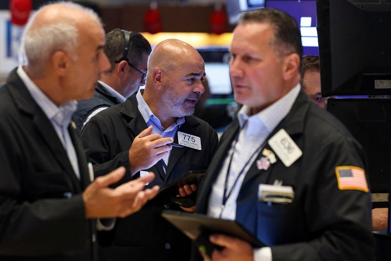 Trading Day: World stocks boom, Fed cut looms