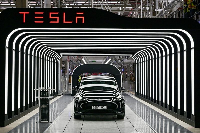 Tesla shares drop almost 6% after results