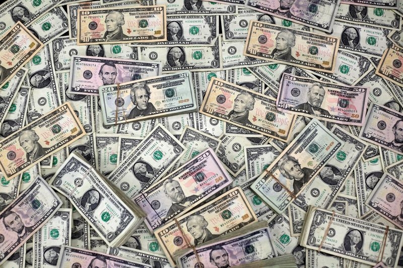 US dollar outlook more subdued, but tariffs souring sentiment: Reuters poll