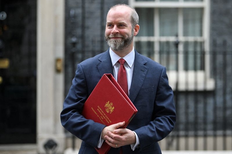 Britain ready to implement US tariff deal, trade minister says