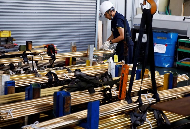 Japan's factory activity slips back into decline in July, PMI shows