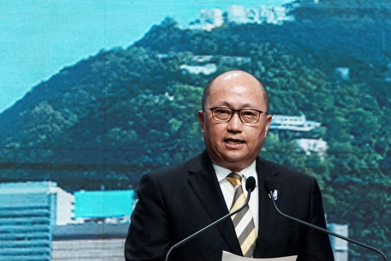 Hong Kong leader says sudden removal of China's top official in the city was "normal"