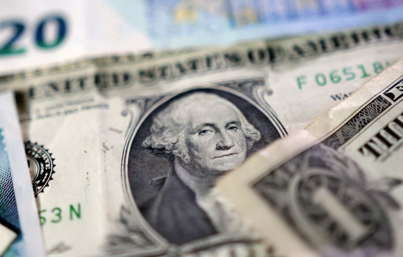 Dollar holds near six-week low as trade war wears on US economy