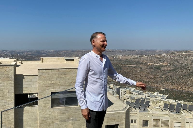 US families accuse Palestinian-American billionaire of facilitating Hamas attacks