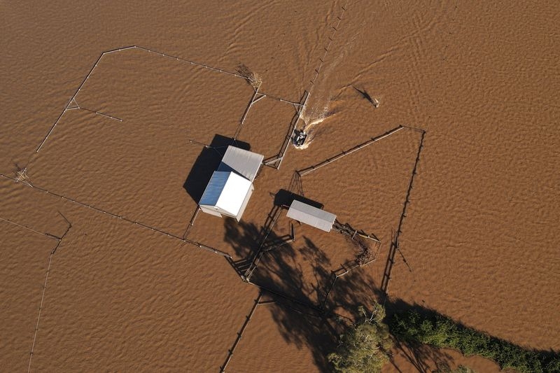 Australian authorities airdrop supplies to farmers stranded by flood crisis