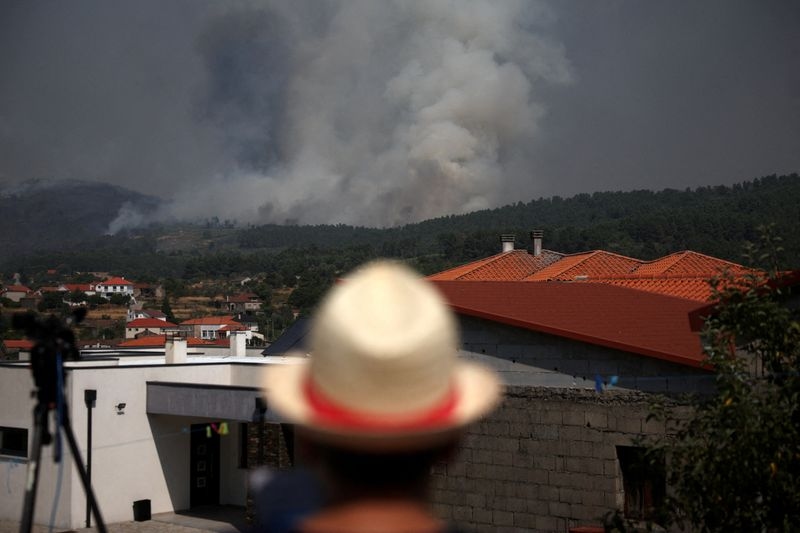 Wildfires kill three across southern Europe, force thousands to evacuate