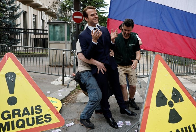 Greenpeace removes wax statue of Macron over French trade with Russia