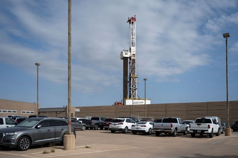 Oil rises as draw in US crude stocks signals firm demand