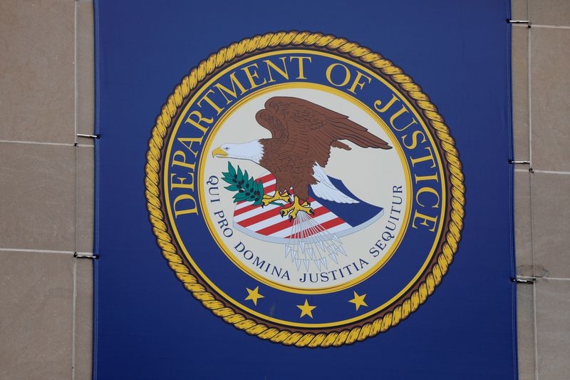 US Justice Department fires two tied to Trump probes, people familiar say