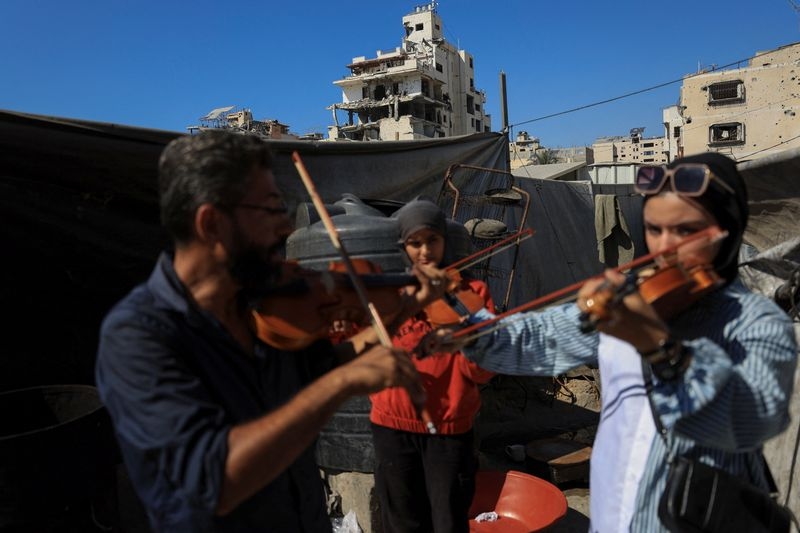 Gaza's young musicians sing and play in the ruins of war