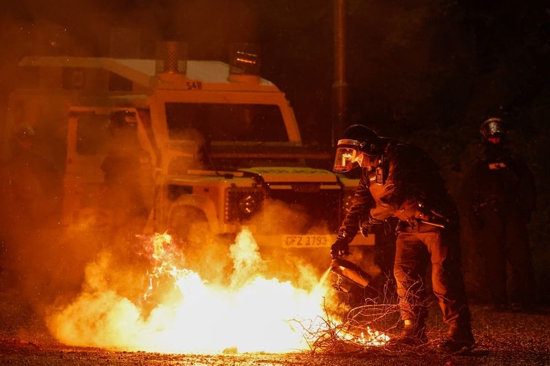 Police attacked as Northern Irish violence spreads to another town