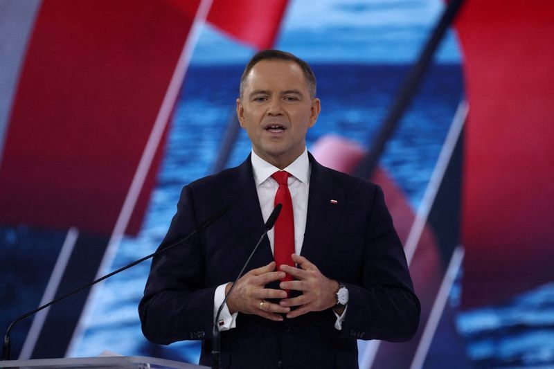 Polish presidential candidate takes flak for praising literary alter ego