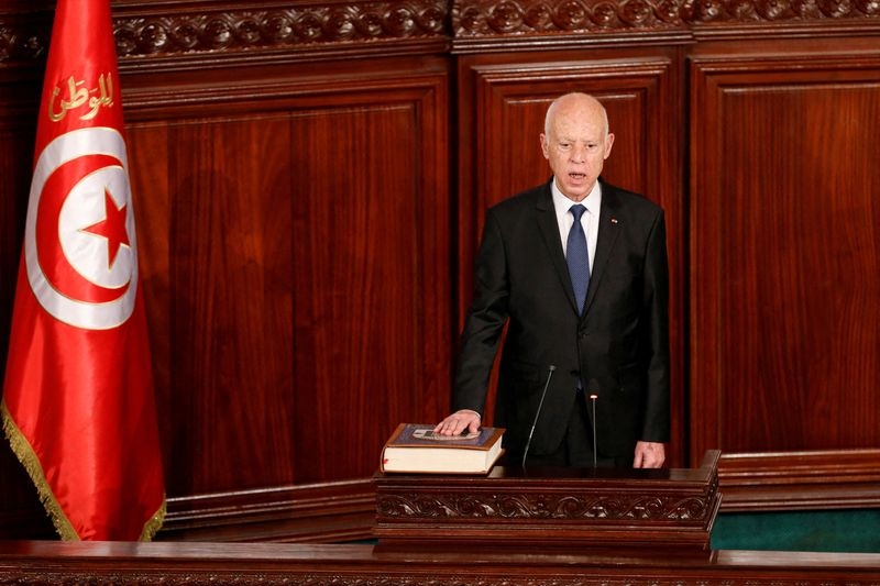 Tunisia leader's opponents, supporters stage rival rallies in sharp political split