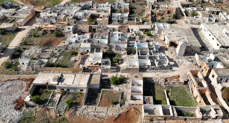 Lacking aid, Syrians do what they can to rebuild devastated Aleppo