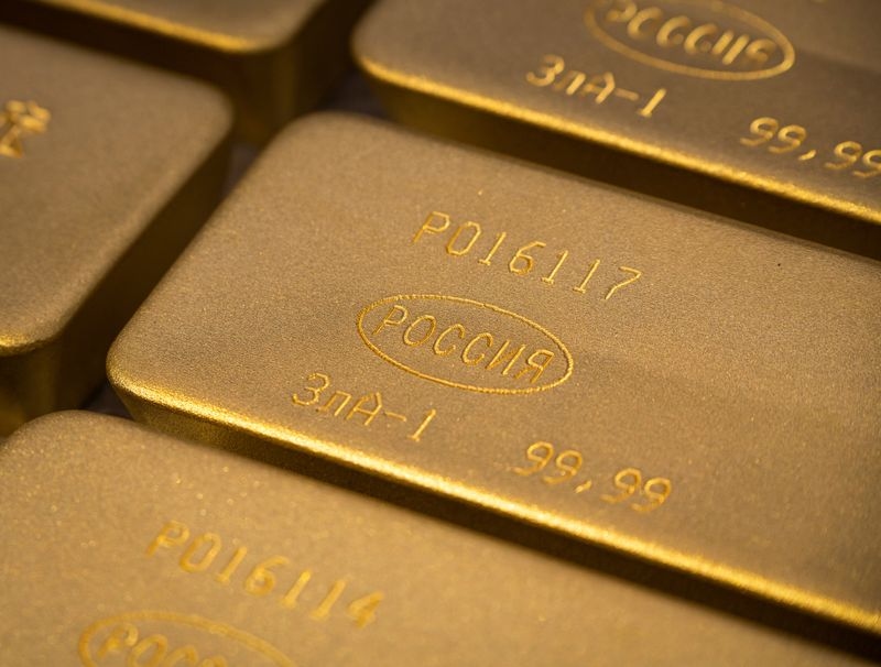 Gold gains as soft US data pressures dollar, fuels rate-cut bets