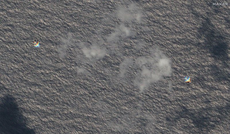 Exclusive-Satellite images show fresh Chinese bomber deployment in South China Sea