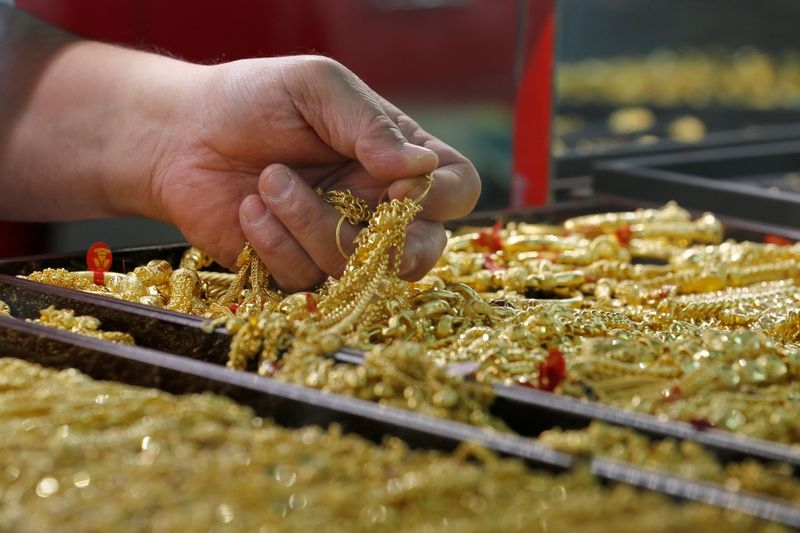 Gold climbs over 1% on safe-haven bids as Trump imposes fresh tariffs